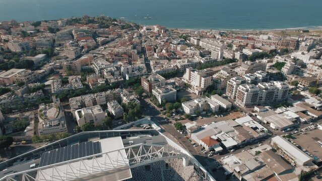 Aerial footage of Tel Aviv-Yafo new bloomfield football stadium, Israel - pull out reveal #016