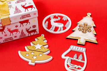 New Year banner for the site, a festive box with toys on a red background.