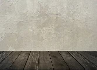 Empty wood table top with concrete wall