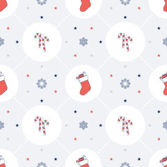 Fototapeta na wymiar Christmas seamless pattern with candy cane and xmas stocking in flat design