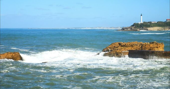 Magnificent view of the beach of Biarritz in the south west of France with its lighthouse and its city in the background