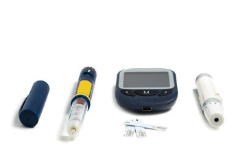 Measuring blood sugar. Glucometer with insulin pen on a white background. Isolate.