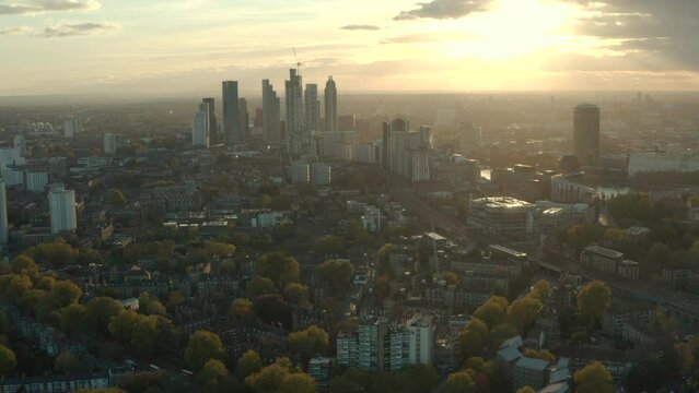 Slow aerial shot over south London towards Vauxhall skyscrapers