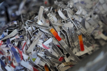Recycled bank card. Recycled Documents. Remains of documents after disposal.