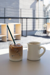 ice latte and americano on the table.