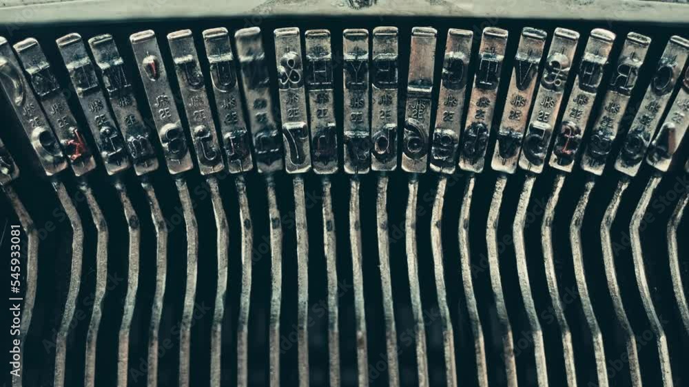Poster typo keys of a old manual typewriter typing on a retro writing machine, close up