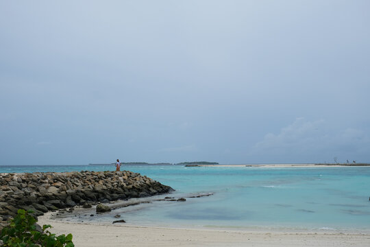 Maafushi is one of the biggest and most popular local islands in Maldives. The beach area during raining season.