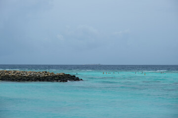 Maafushi is one of the biggest and most popular local islands in Maldives. The beach area during raining season.