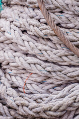 london, united kingdom, october 22, 2022: close-up of an old frayed boat rope as a nautical background