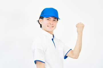 ガッツポーズする引越し業者の男性　白背景