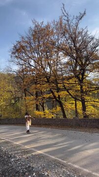 Woman skating in the nature