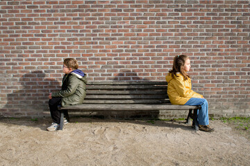Fototapeta na wymiar Resentment of teenagers. concept. Teenagers boy and girl quarreled