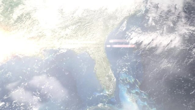 Earth zoom in from outer space to city. Zooming on Gainesville, Florida, USA. The animation continues by zoom out through clouds and atmosphere into space. Images from NASA