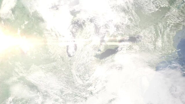 Earth zoom in from outer space to city. Zooming on Ann Arbor, Michigan, USA. The animation continues by zoom out through clouds and atmosphere into space. Images from NASA