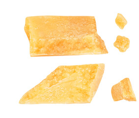 Pieces of parmesan cheese isolated on white background. Hard mature cheese Parmesan, Parmigiano in rough cubes top view, flat lay..