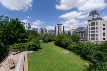 Garden of the Grands Moulins Abbé Pierre in the 13th arrondissement of Paris city - obrazy, fototapety, plakaty