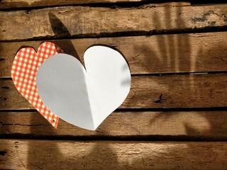 heart icon of love on wooden background
