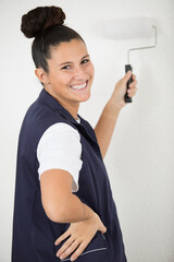 beautiful woman renovating her apartment