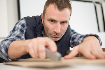 man during wood cutter