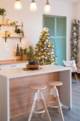 Modern Kitchen Interior with Island, Sink, Cabinets in New Luxury Home Decorated in Christmas Style