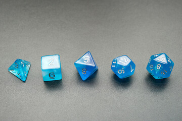 set of five blue platonic dice
