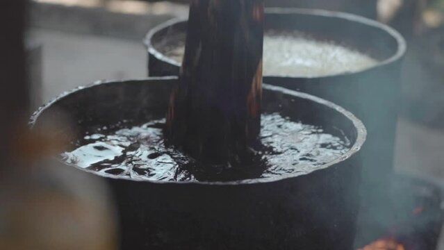 Slow Motion - Technique of traditional Batik Dyeing in the Boiling Water