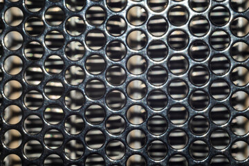 Black color mesh background. Metal steel greed.