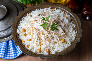 Traditional delicious Turkish food; Rice with chickpeas and chicken (Turkish name; Tavuklu nohutlu pilav or pilaf)