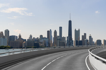 Plakat Empty urban asphalt road exterior with city buildings background. New modern highway concrete construction. Concept of way to success. Transportation logistic industry fast delivery. Chicago. USA.