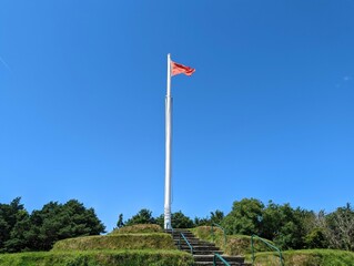 A view of Tynwald Hill in St. John's on the Isle of Man. This is an ancient landmark established by Norse Viking settlers, where an open air meeting of the Island's parliament happens once a year.