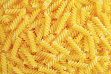 Pile of raw italian fusilli pasta