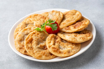 Delicious meat pie from Turkish cuisine. Fried handmade pies. Turkish name; fincan boregi