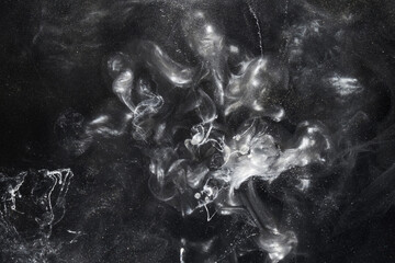 Black white gray alcohol ink background. Dark paint underwater explosion. Wavy stains splashes...