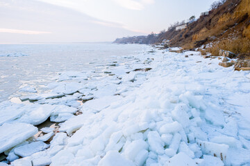The frozen winter Azov sea on the beach of Taganrog city, Rostov region of Russia