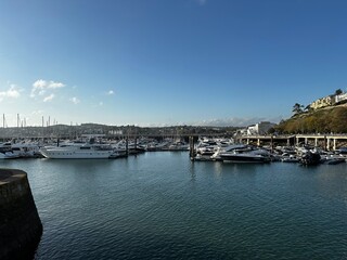 Fototapeta premium Boats in a harbour on a sunny day. Torquay, Devon, England