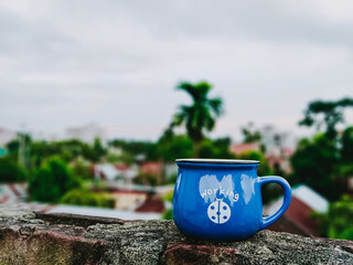 Indian chai in working Emoji Cup ,Green background