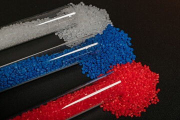 Close-up of plastic polymer granules. hand hold Polymer pellets. polymer plastic. compound...