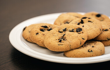Cookies with chocolate chips close-up on a plate.