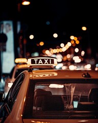 Vertical shot of a glowing bright Taxi sign on a car roof in the evening on a bokeh background