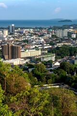 Obraz premium Aerial view of cityscape Phuket surrounded by buildings and water