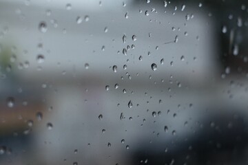 View of the window covered with raindrops and fog, suitable for backgrounds