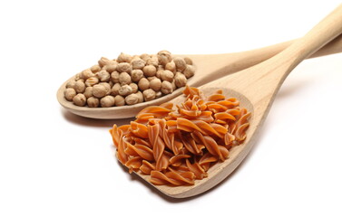 Fusilli made from chickpeas, pile  uncooked in wooden spoon isolated on white