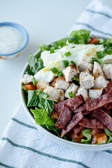 Vertical high angle shot of a bowl of healthy salad