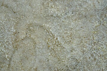 Closeup shot of the salt of the Tuz Golu (Salt lake) at Aksaray on a cloudy day