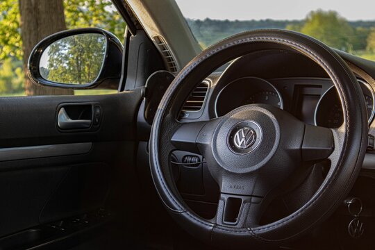 Volkswagen stearing wheel with vw key in the dashboard