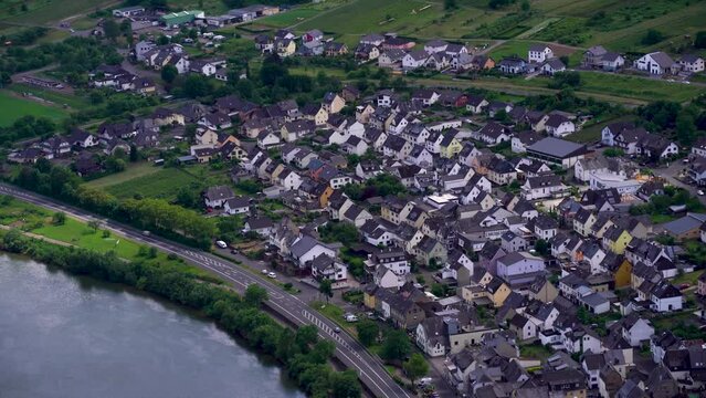 Beautiful view from a drone of a road on a bank of a river and houses in Bremm Germany