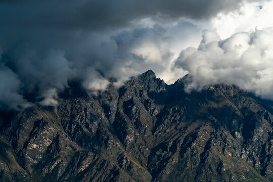 Fototapeta Scenic view of the Remarkables slopes under the clouds in Queenstown