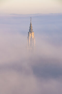 Clouds Around Cathedral Top In Overcast Weather