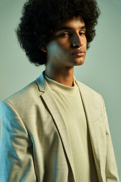 Stylish Hispanic man with Afro hairstyle