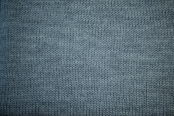 gray knitted sweater texture close-up, gray knitted front surface, gray telpai background, concept, hand-knitted banner, high quality full frame